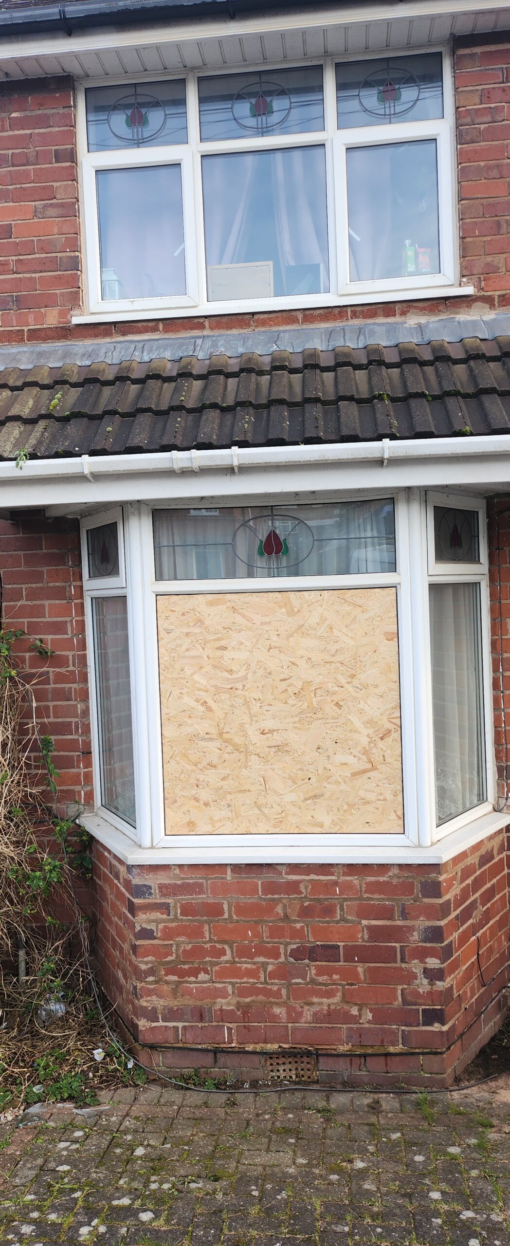 Home Boarded bay window awaiting replacement glass by TLC Window Doctors