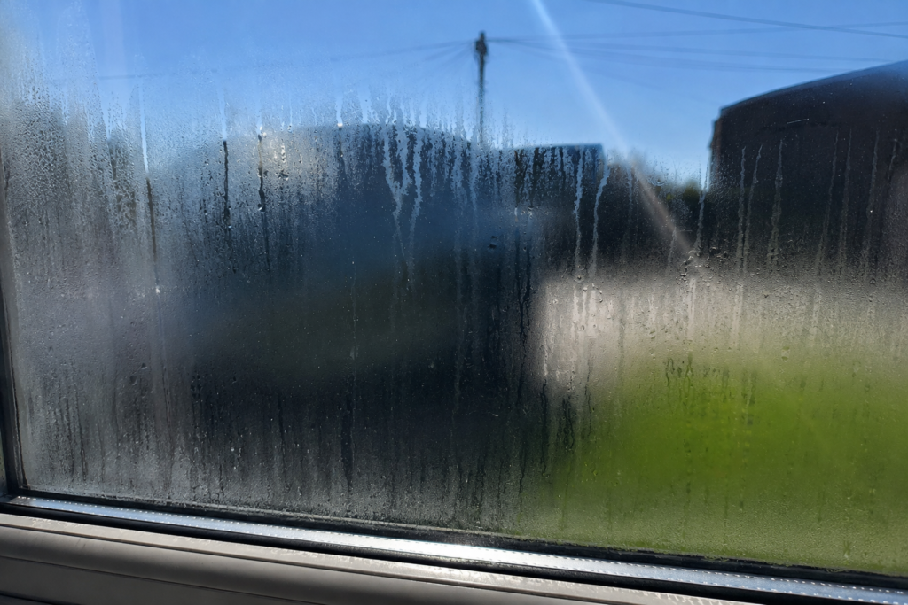 drain-cleaning Misted double glazed window before replacement