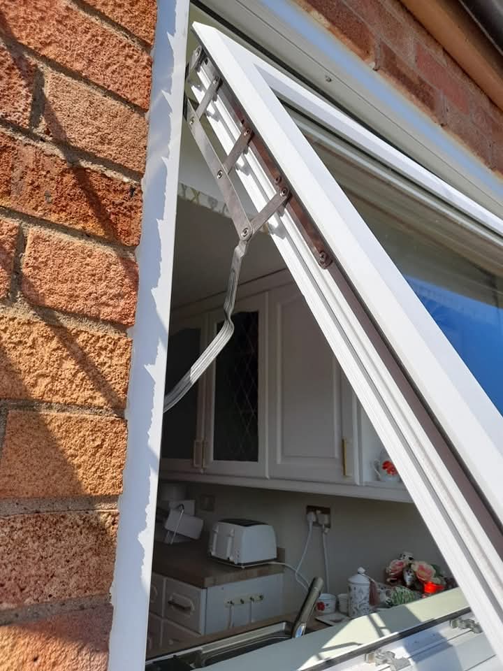 Window hinge replacement by TLC Window Doctors