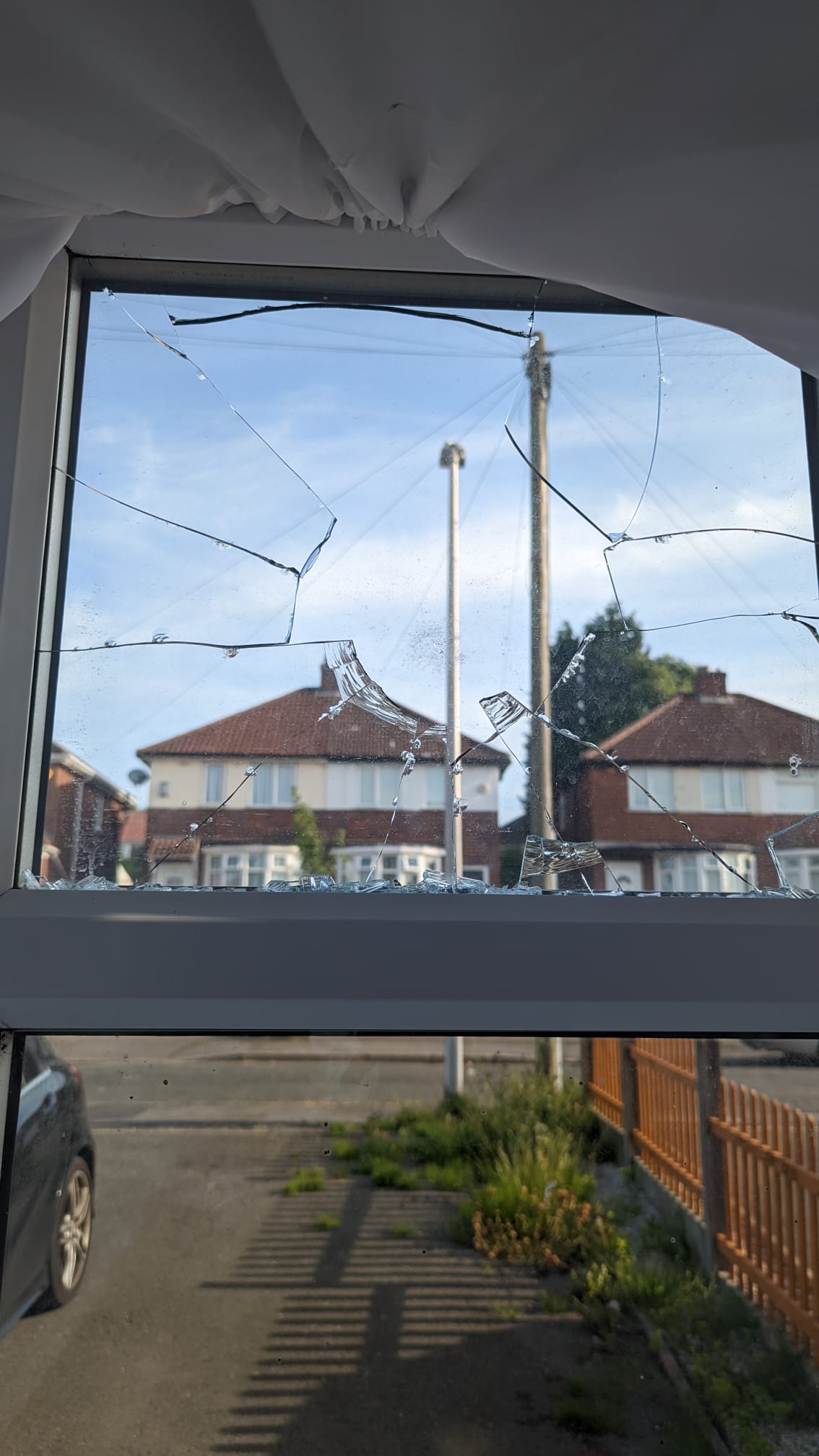 Broken window glass requiring replacement by TLC Window Doctors